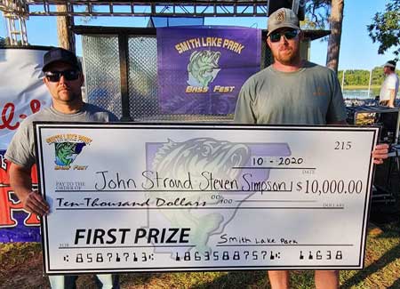 John Stround and Steven Simpson with $10,000 check