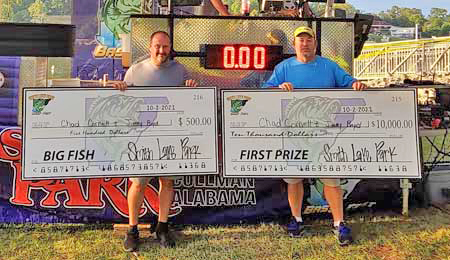 Chad Cornett and Jimmy Boyd with $10,000 check and $500 check